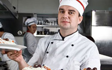Photo of a restaurant manager in a kitchen